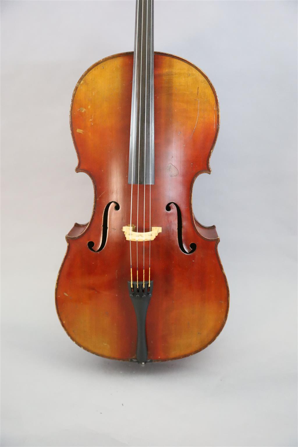 A late 19th/early 20th century German cello, labelled Schutz HD junior Marke, length of back 77cm